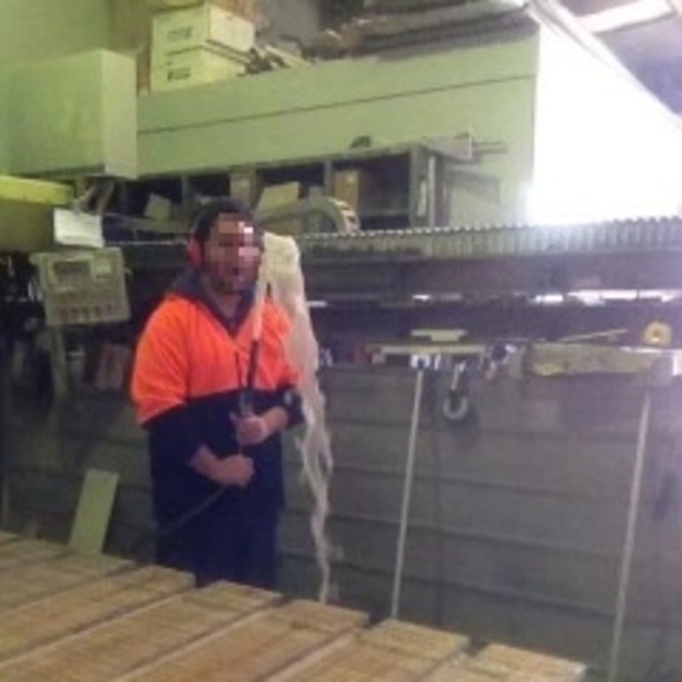 Another of Mr Donnelly's colleagues operating stone-cutting tools without wearing a mask. Picture: Supplied.