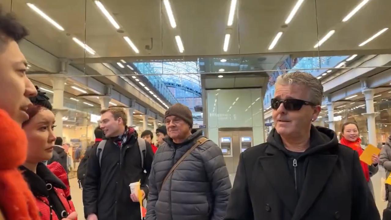 A man with the group, left, began screaming at Kavanaugh. Picture: YouTube