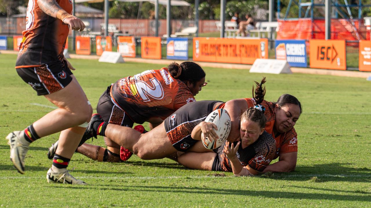 Ayesha Kay is tackled at the 2024 Deadly Cup Carnival between the Indigenous All Stars and Territory All Stars. Picture: Pema Tamang Pakhrin