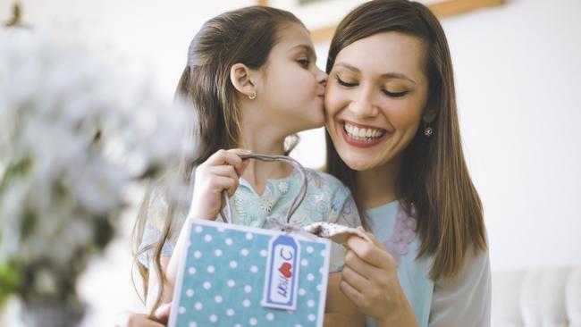 Happy mother posing with her daughter