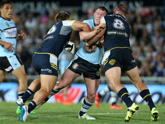 Points, points and more points. Paul Gallen hits up the  Cowboys defence. He’ll set you back a cool $499,500. Picture: Adam Head