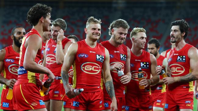 The Suns, jubilant after their 53-point win over the Crows. Picture: Chris Hyde/Getty