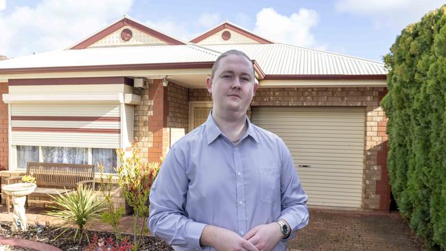 Jack Elliott, who bought three properties by his 25th birthday, at his mum’s home in Adelaide’s north. Picture: Kelly Barnes