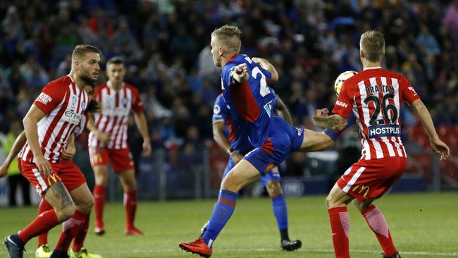 Riley McGree scores his wonder goal for Newcastle against Melbourne City in the semi-final match last season. Picture: AAP