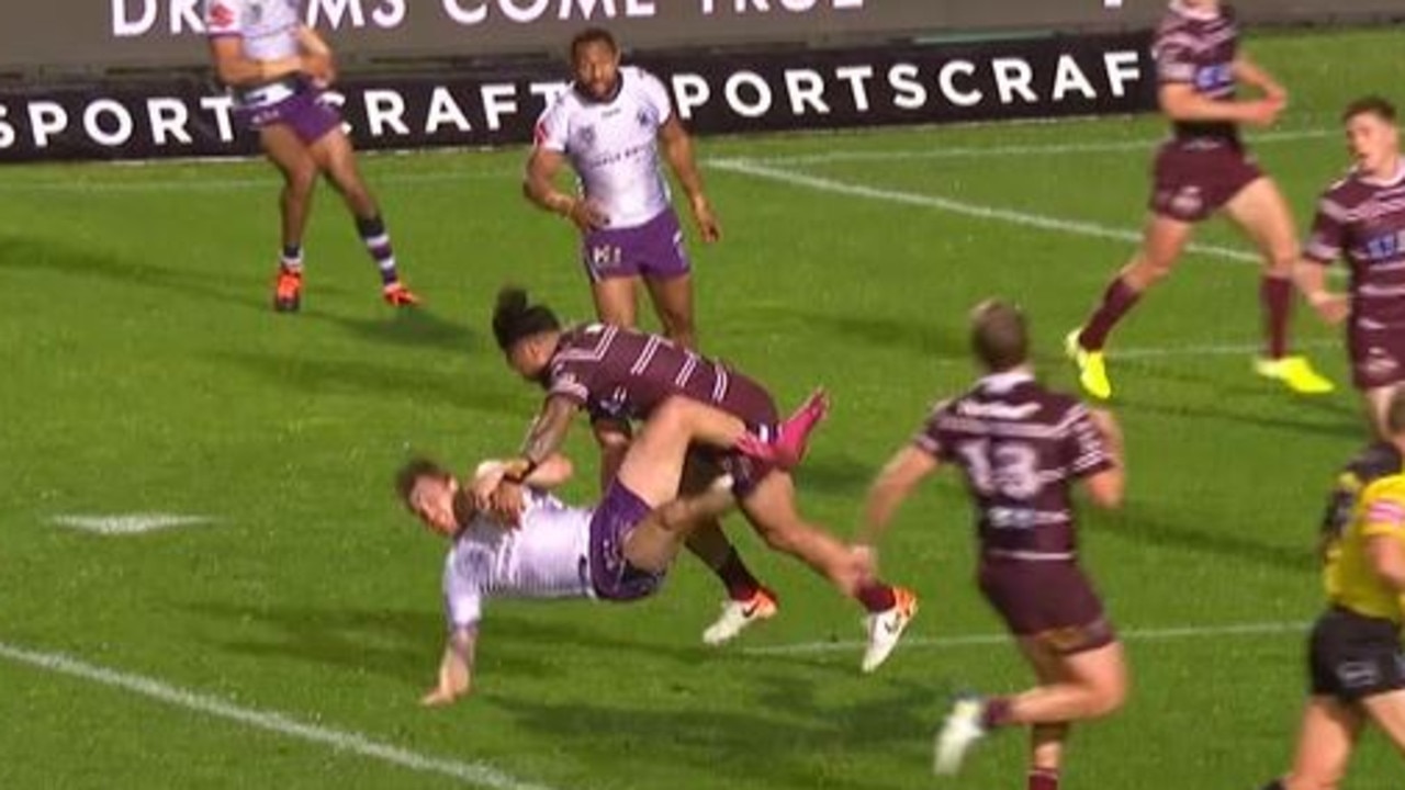 Jorge Taufua lays out Cameron Munster with a huge hit.