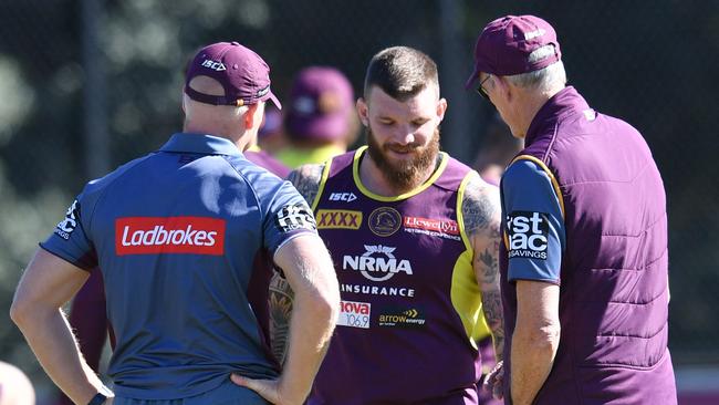 Josh McGuire (centre) made a mysterious exit from Brisbane training.