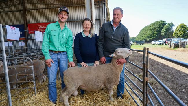 Nutrien Ballarat livestock agent Lachie Baker, and Pinevite Poll Dorset stud co-principals Lila and James Sharrock. Picture: Rachel Simmonds