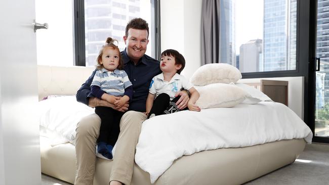 Mark Flynn with kids Zachary, 3, and Ethan, 1, pictured at their apartment in Sydney. They recently switched energy providers to save. Picture: Sam Ruttyn