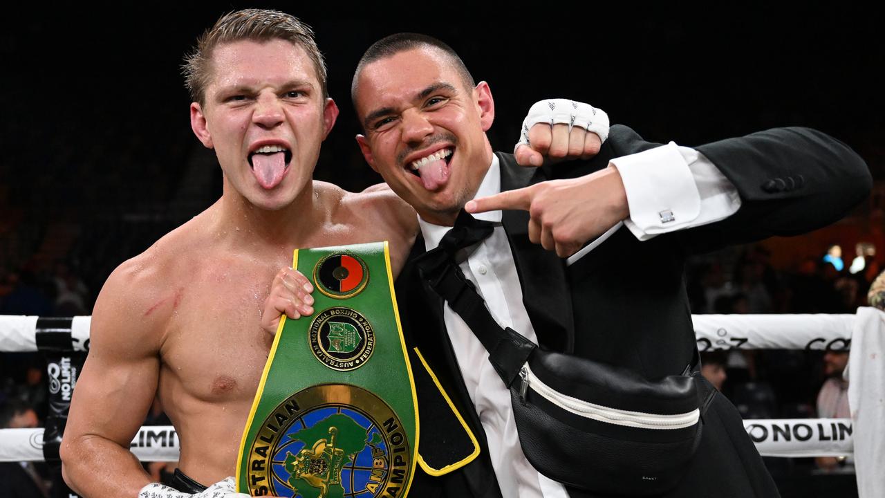 Nikita Tszyu celebrates his victory with brother Tim. Pic: No Limit Boxing