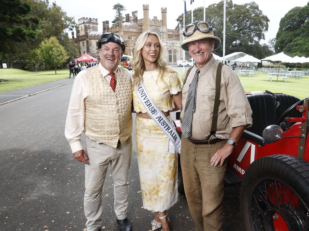 Daily Telegraph journalist Matthew Benns, Miss Australia Zoe Creed and Daily Telegraph cartoonist Warren Brown with the 1924 Bean. Picture: Richard Dobson