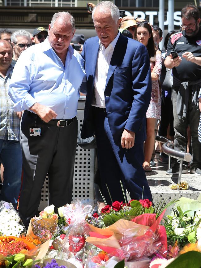 Lord Mayor Robert Doyle and PM Malcolm Turnbull at the flower shrine on Bourke St. Picture: Yuri Kouzmin