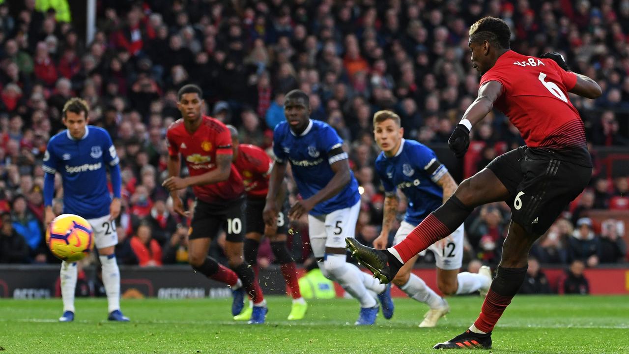 Paul Pogba has this penalty saved. (Photo by Paul ELLIS / AFP)