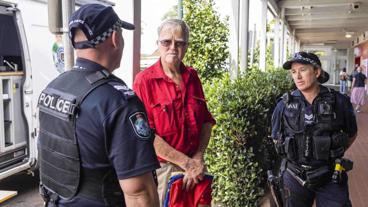 Senior Constable Neil Ault and Senior Constable Joanne Bailey chat with Ray Croft outside the Mobile Police Beat parked at Clifford Gardens Shopping Centre. Picture: Kevin Farmer