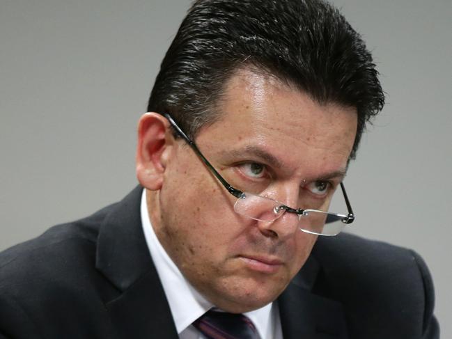 Senator Nick Xenophon sit son The Senate economics reference committee for the public hearing relating to credit card interest rates being held at Portside Centre, Sydney.