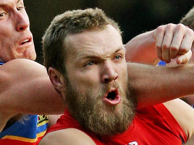 AFL Round 16 - Melbourne v Brisbane Lions at MCG, Melbourne. Max Gawn takes a great pack mark. 19th July 2015. Picture: Colleen Petch.