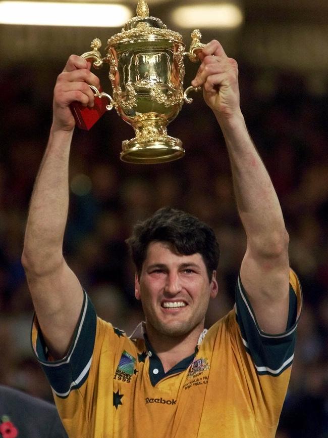 John Eales holds aloft the Web Ellis