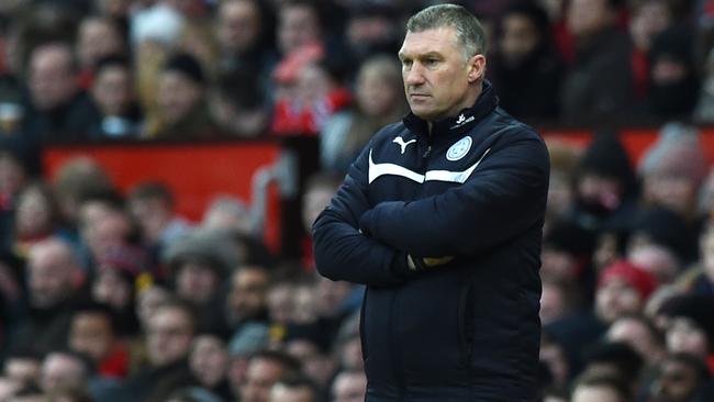 Leicester City's English manager Nigel Pearson watches from the touchline during the English Premier League football match between Manchester United and Leicester City at Old Trafford in Manchester, northwest England, on January 31, 2015. AFP PHOTO / PAUL ELLIS RESTRICTED TO EDITORIAL USE. No use with unauthorized audio, video, data, fixture lists, club/league logos or “live” services. Online in-match use limited to 45 images, no video emulation. No use in betting, games or single club/league/player publications