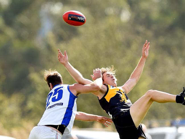 NFL footy: Whittlesea V West Preston-Lakeside. No 25 Machael Batey for West Preston Lakeside, No 12 Max Dyson for Whittlesea. Picture: David Smith