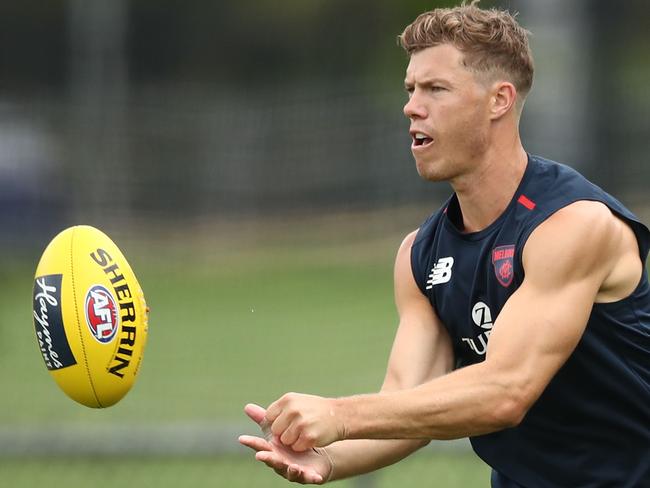 MELBOURNE, AUSTRALIA - DECEMBER 21:  Jake Melksham of the Demons runs with the ball during a Melbourne Demons AFL training session at Gosch's Paddock on December 21, 2018 in Melbourne, Australia. (Photo by Scott Barbour/Getty Images)