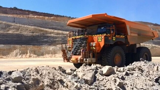 A dump truck pulls in to be loaded at a Queensland mine. Picture: Tessa Mapstone