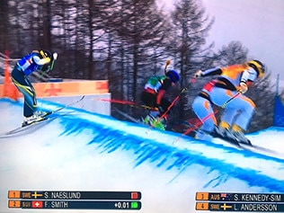 Sami Kennedy-Sim (left) trails the field after a horror start in her ski cross semi-final. Photo: Channel 7