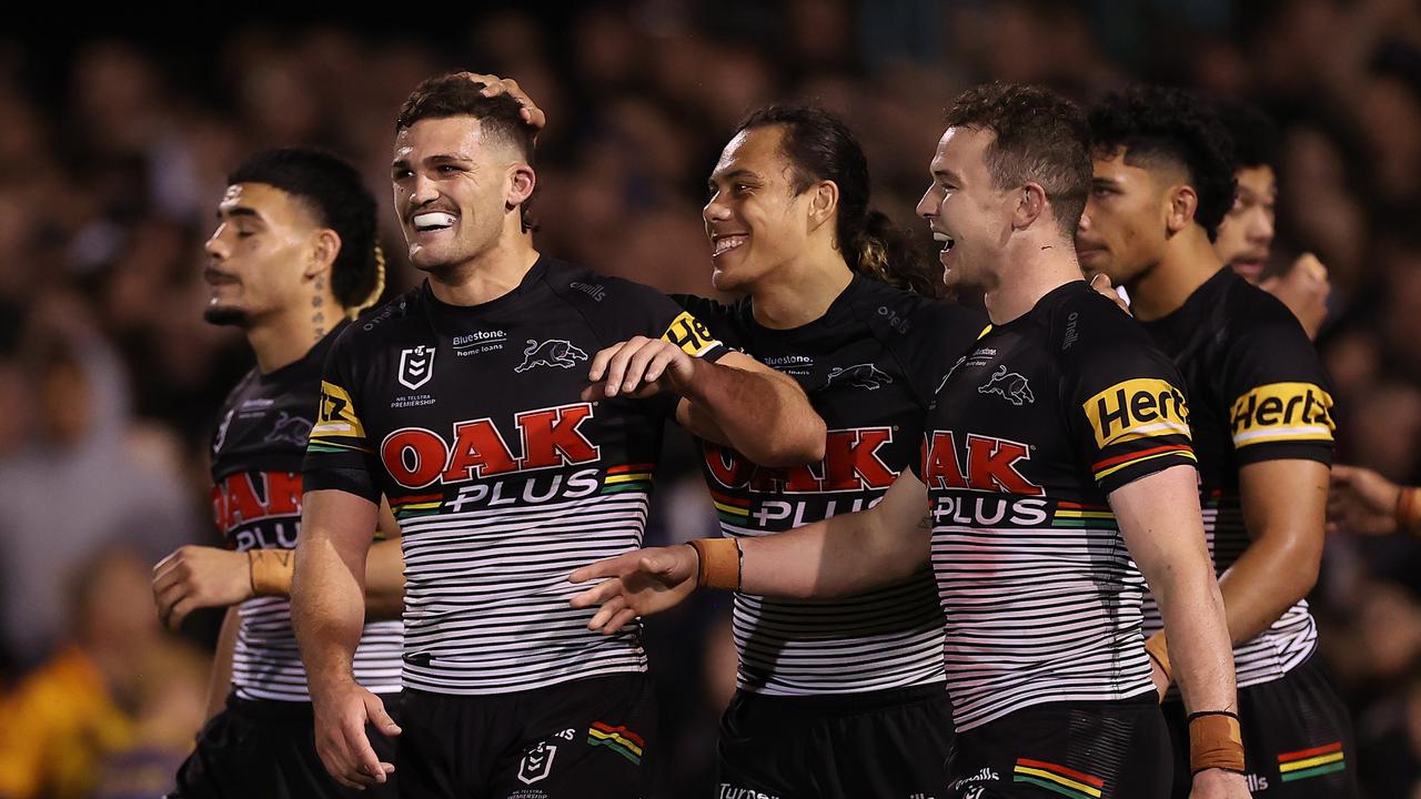 PENRITH, AUSTRALIA - SEPTEMBER 09: Dylan Edwards of the Panthers celebrates with Jarome Luai of the Panthers and Nathan Cleary of the Panthers after scoring a try during the NRL Qualifying Final match between the Penrith Panthers and the Parramatta Eels at BlueBet Stadium on September 09, 2022 in Penrith, Australia. (Photo by Mark Kolbe/Getty Images)