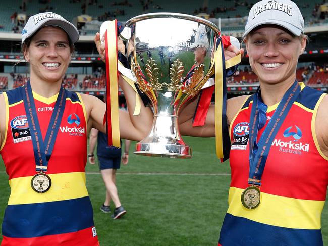 Crows co-captains Chelsea Randall (left) and Erin Phillips with the 2019 AFLW premiership cup, won in March in front of more than 53,000 people at Adelaide Oval. Picture: Michael Willson/AFL photos