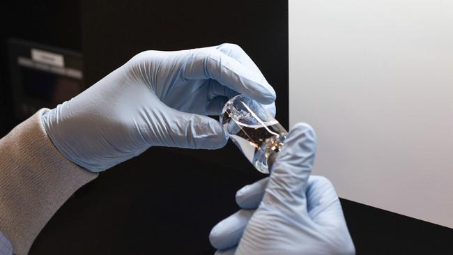 A vial of the drug remdesivir is inspected at a Gilead site in the US. Picture: AP