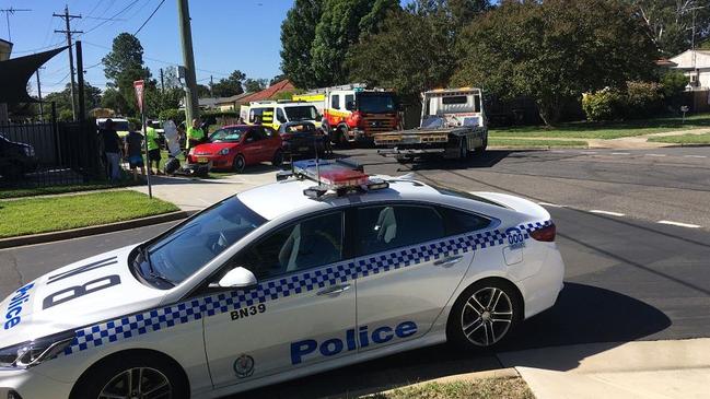 Emergency crews at the scene of a recent crash at the intersection of Crawford Rd and Coveny St, Doonside. Picture: JJ Bomford