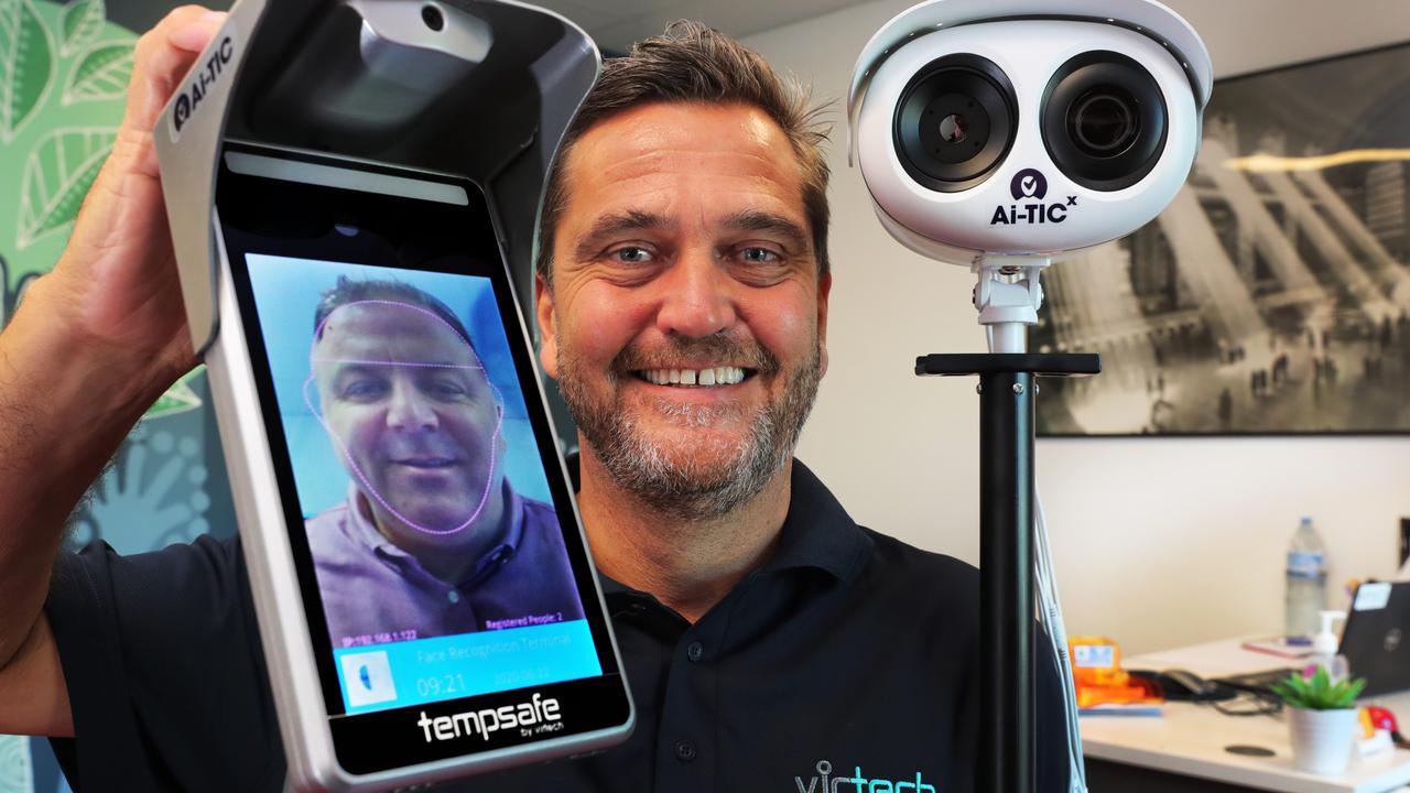 Brett McCallum (on screen) and Stuart Norris showing off Virtech temperature monitoring technology during the Covid-19 era. Picture: Glenn Hampson