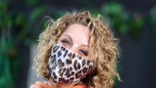 Facial expressions are hard to read whilst people are wearing masks during he pandemic. Narelle Rutherford smiles underneath her mask. Picture: Alex Coppel.