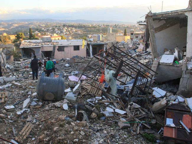 Displaced Lebanese returning to their homes inspect the damage in the southern Lebanese village of Tair Debba. Picture: AFP