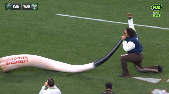 Tyler Manoa blows the Viking horn in Las Vegas. Picture: Fox League