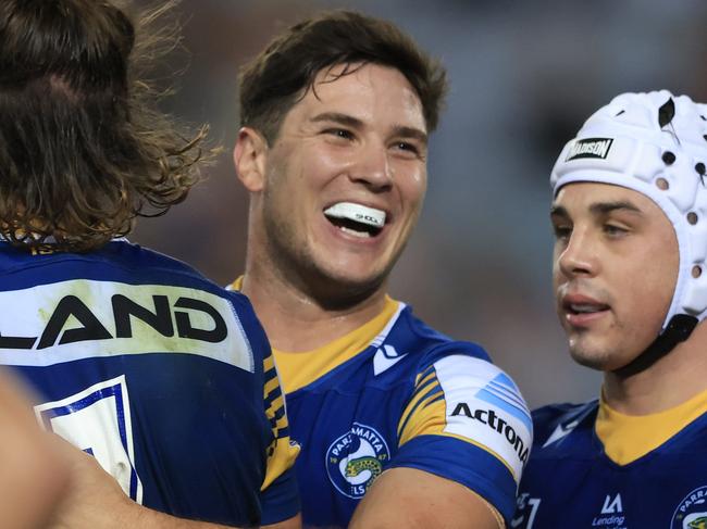 SYDNEY, AUSTRALIA - MAY 01: Mitchell Moses of the Eels celebrates a Clint Gutherson try during the round eight NRL match between the Canterbury Bulldogs and the Parramatta Eels at Stadium Australia, on May 01, 2021, in Sydney, Australia. (Photo by Mark Evans/Getty Images)