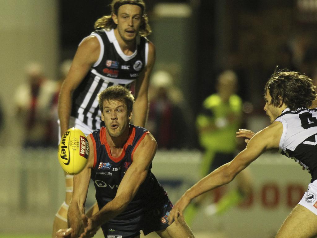 SANFL: Norwood v Port Adelaide at The Parade. Norwood's Brady Dawe gets a handball out which resulted in a goal to Cody Szust. 18 April 2019. Picture Dean Martin