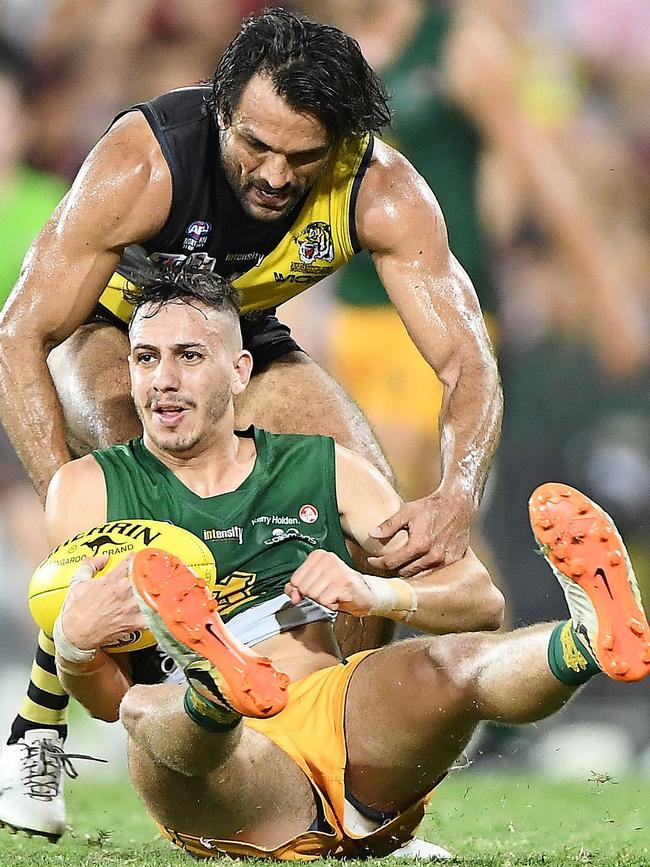 Nightcliff utility Shaun Wilson attempts a tackle against St Mary’s during the 2020-21 NTFL Grand Final. Picture: Felicty Elliott/AFLNT Media