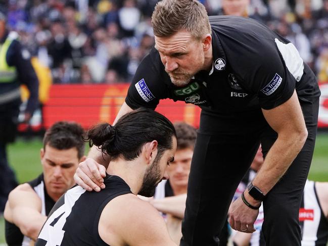 Magpies coach Nathan Buckley hugs Brodie Grundy after their defeat in the 2018 AFL Grand Final. Picture: Getty Images