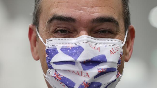 Premier Steven Marshall wearing a mask manufactured in Adelaide. Photo: Tait Schmaal.