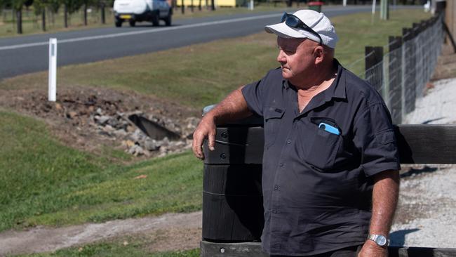 Bruce Green looks out with his brother Warren's house in the background at Palmers Channel. Bruce says Warren is on the mend after suffering a stroke while walking to do his daily shopping. Picture: Adam Hourigan