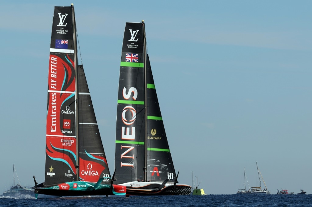 Britain's Ineos Britannia (R) and defender Emirates Team New Zealand compete on the final day of the America's Cup