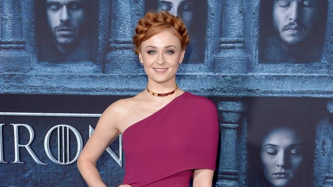 Sophie Turner looks stunning in purple.