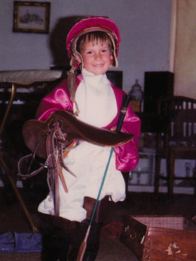 Hugh Bowman at four in his father Jim’s jockey gear. Picture: Bowman family