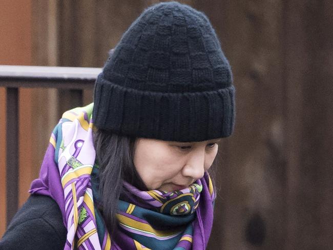 FILE  - In this Wednesday, Dec. 12, 2018 file photo, Huawei chief financial officer Meng Wanzhou leaves her home in Vancouver, British Columbia. A Chinese court has sentenced a Canadian man to death in a sudden retrial in a drug smuggling case that is likely to escalate tensions between the countries over the arrest of a top Chinese technology executive. The Chinese press began publicizing  Robert Lloyd Schellenberg's case in December after Canada detained Meng Wanzhou, chief financial officer of the Chinese telecommunications giant Huawei, on Dec. 1 at the request of the United States. (Jonathan Hayward/The Canadian Press via AP, File)