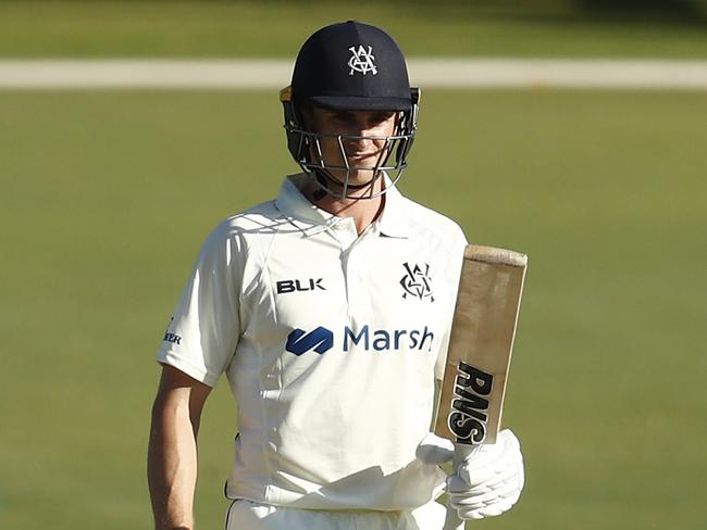 Star Waratah allrounder James Seymour raises his bat after scoring 50 for Victoria during day two of the Sheffield Shield match between the Bushrangers and South Australia at Junction Oval. Picture: Darrian Traynor/Getty Images