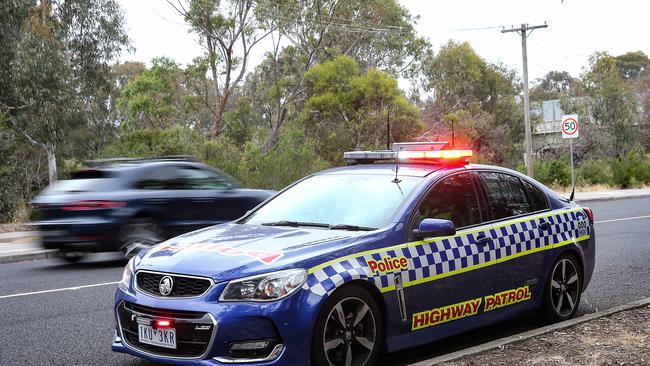 Industrial action taken by Victorian police is set to ramp with union members to alert motorists to speed cameras, refuse to take unpaid overtime and mark cop cars with anti-government messaging. Picture : Ian Currie
