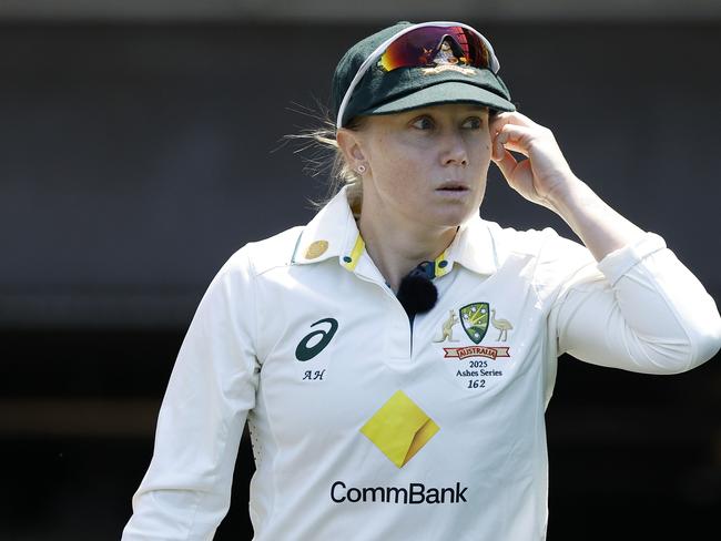 MELBOURNE, AUSTRALIA - JANUARY 30: Alyssa Healy of Australia walks up the player race during day one of the Women's Ashes Test Match between Australia and England at Melbourne Cricket Ground on January 30, 2025 in Melbourne, Australia. (Photo by Daniel Pockett/Getty Images)