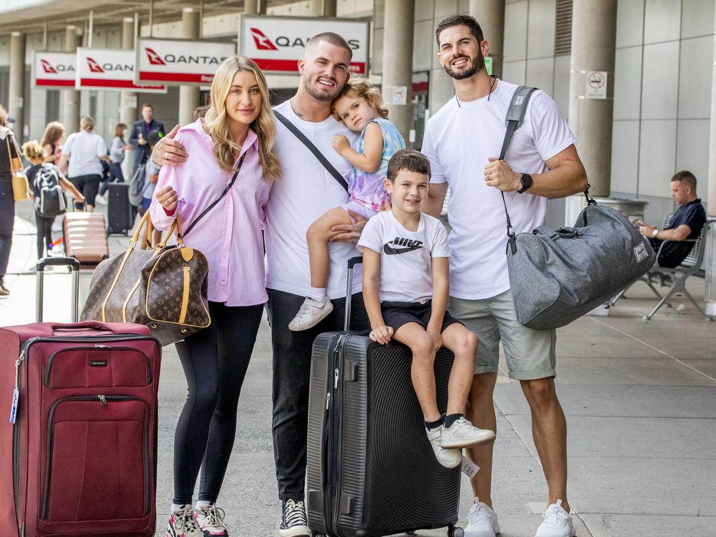 Taylor Reid (centre) with partner Victoria, brother Nathan, and Chloe and Oliver at Brisbane Airport for start of Easter Holidays on Friday. Picture: Richard Walker