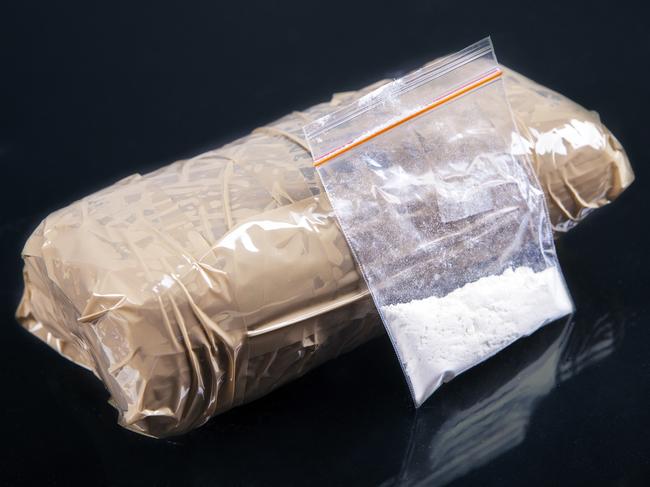 Drug runner busted with 12kg of coke after running red light, crashing