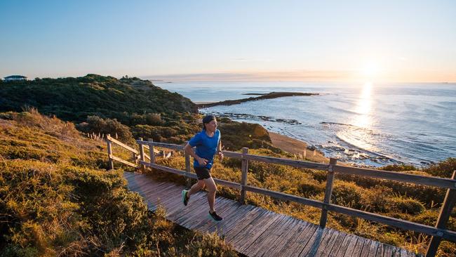 Bondi Rescue television series stars Andrew "Reidy" Reid (pictured) and five others will run a marathon on kunanyi Mount Wellington.