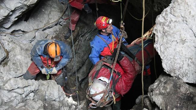 Rescue workers bring injured spelunker Johann Westhauser to the surface from the Riesendi